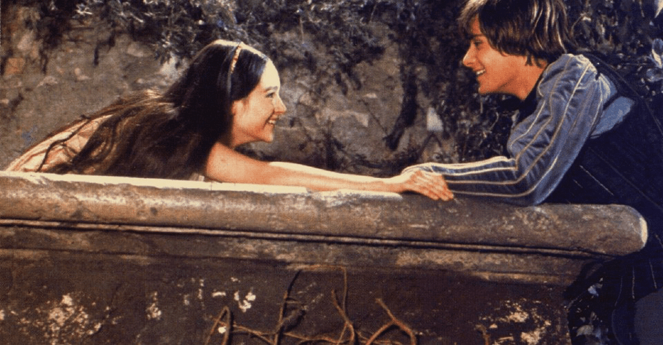 A woman and man sitting in the tub
